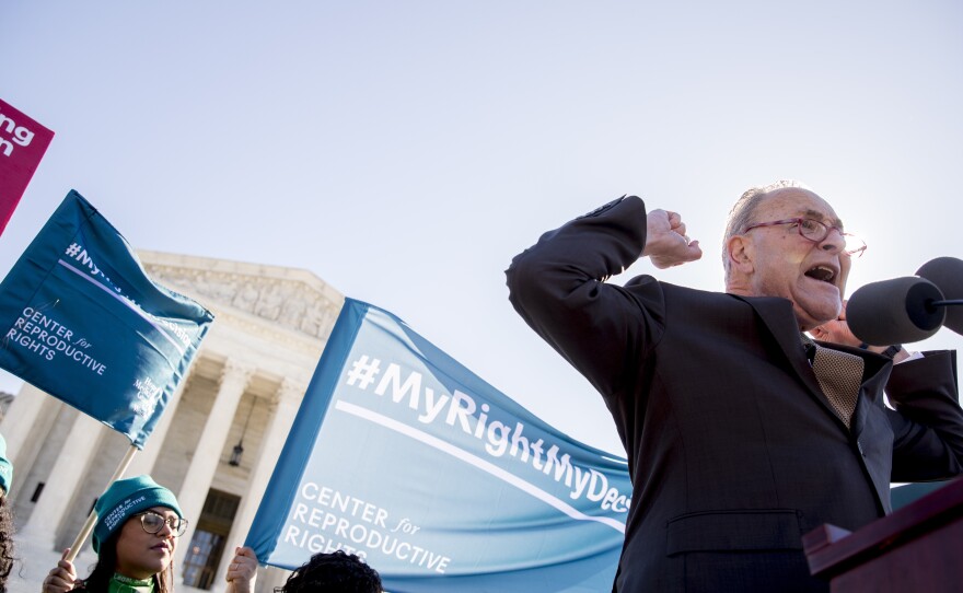 Senate Minority Leader Chuck Schumer is being criticized for comments he made to abortion-rights activists at a rally outside the Supreme Court on Wednesday.