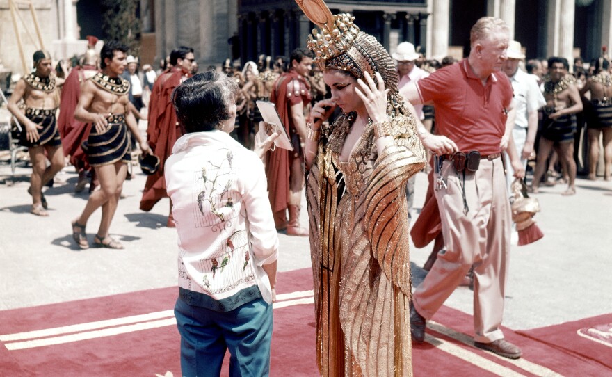 British actress Elizabeth Taylor readies for a scene in the 20th Century-Fox's filming of Cleopatra at Cinecittà in 1962.