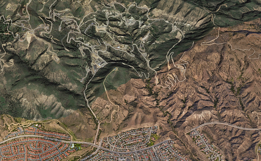 In this Google Earth image, homes in the Porter Ranch community of Los Angeles are seen below the Aliso Canyon natural gas storage field.