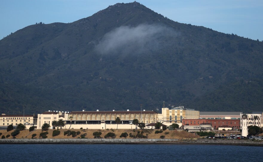 Health officials are working to keep a fast-moving coronavirus outbreak at California's San Quentin State Prison from spreading into the broader Bay Area community.