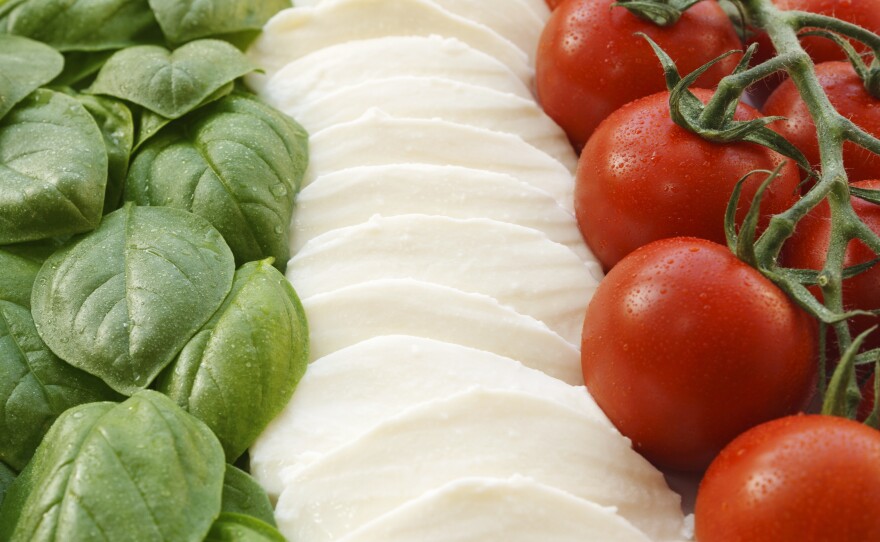 The Italian flag made up of three ingredients that help form the base of the country's cuisine: basil, mozzarella and tomatoes.