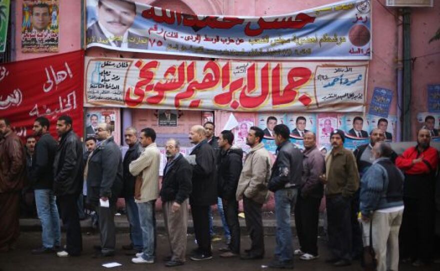 Voters line up outside a polling station on November 28, 2011 in Cairo, Egypt.