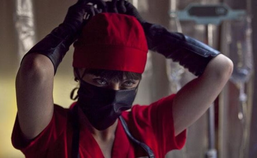 Katharine Isabelle as Mary doing what she does best in "American Mary."