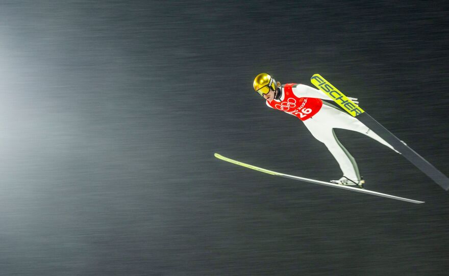 Norway's Robert Johansson soars through heavy snow fall during the Ski Jumping Men's Large Hill official training on February 13, 2022 during the Beijing 2022 Winter Olympic Games.