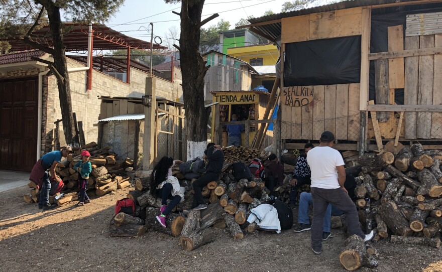Roughly 150 adults and children are gathered at a stash house, waiting around for their trip northward.