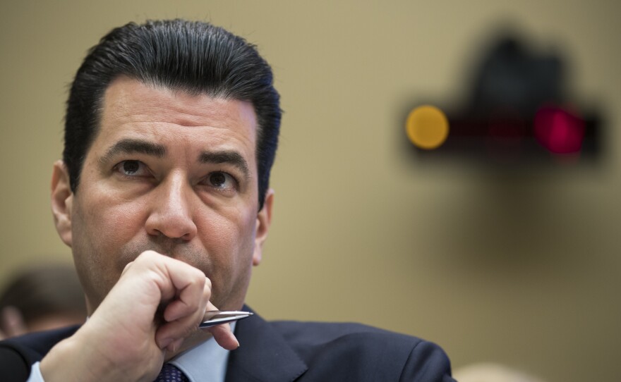 Dr. Scott Gottlieb, then commissioner of the Food and Drug Administration, testifies during a House hearing on in October 2017. In an NPR interview, Gottlieb says he doesn't expect enough demand for the COVID-19 vaccine much beyond 160 million Americans.