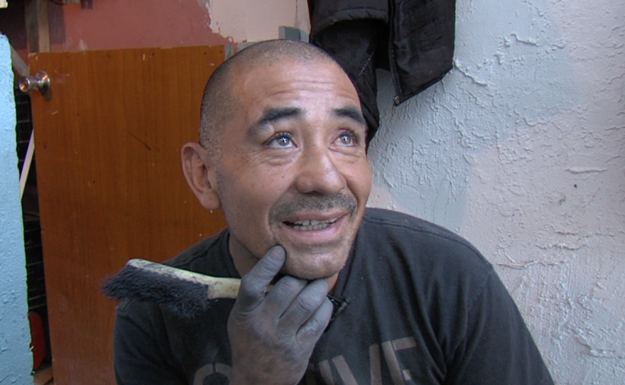 Ricardo Lugo creates a cement sculpture at a Tijuana rehabilitation center, March 30, 2015.