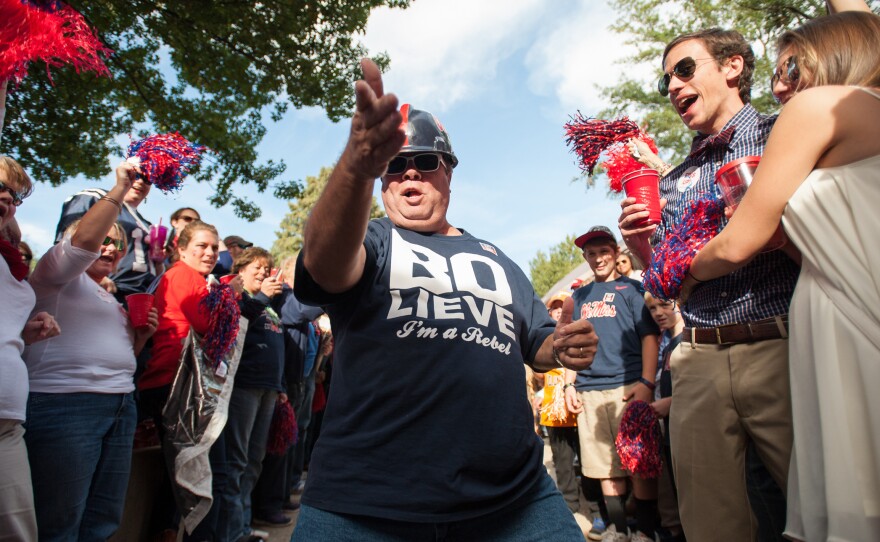 Mississippi Rebels fans cheer for their team prior to their game on October 18. The University of Mississippi has been in an ongoing effort to distance the state's flagship academic institution from its segregationist history.