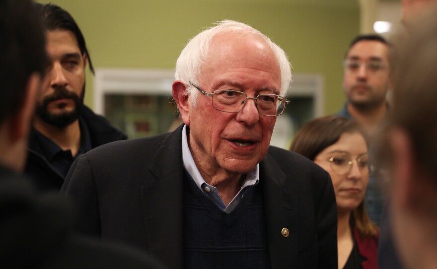 Sen. Bernie Sanders of Vermont greets people during a campaign event in Winterset, Iowa, on Dec. 30. His campaign announced on Thursday that it had raised $34.5 million in the last fundraising quarter.