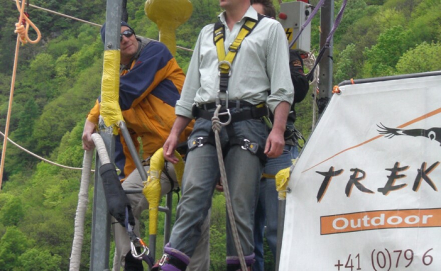 Presenter Michael Mosley gets ready to bungee jump from the Verzasca Dam, Switzerland. At 220m high it is the biggest bungee jump in Europe. Michael wants to see if he can overcome his fears and find the bungee jump pleasurable.