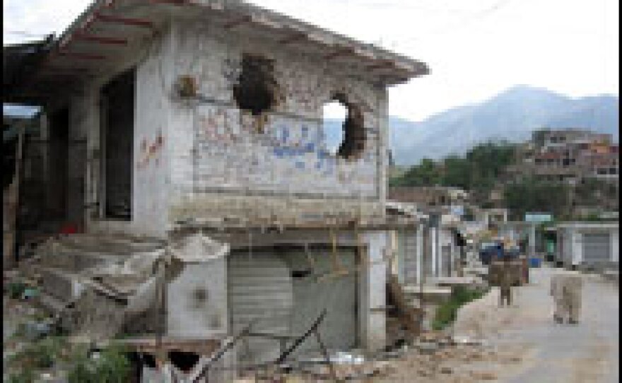 The main bazaar was badly damaged during fighting, along with homes abandoned by families fleeing the conflict.