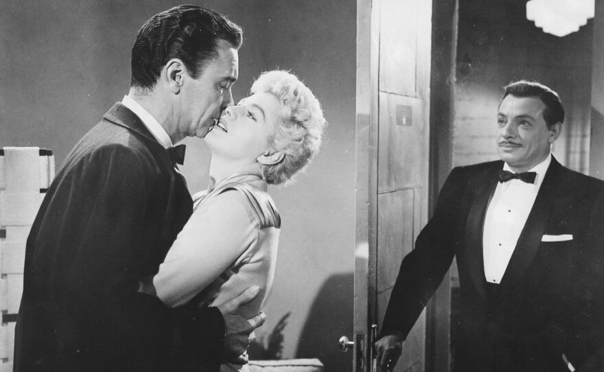 Barry Sullivan and Shelley Winters are up to no good in "Playgirl."