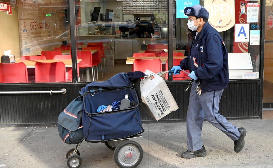 The Postal Service says gloves and surgical masks are made available to all employees who request them, but many postal workers say they don't have what they need.