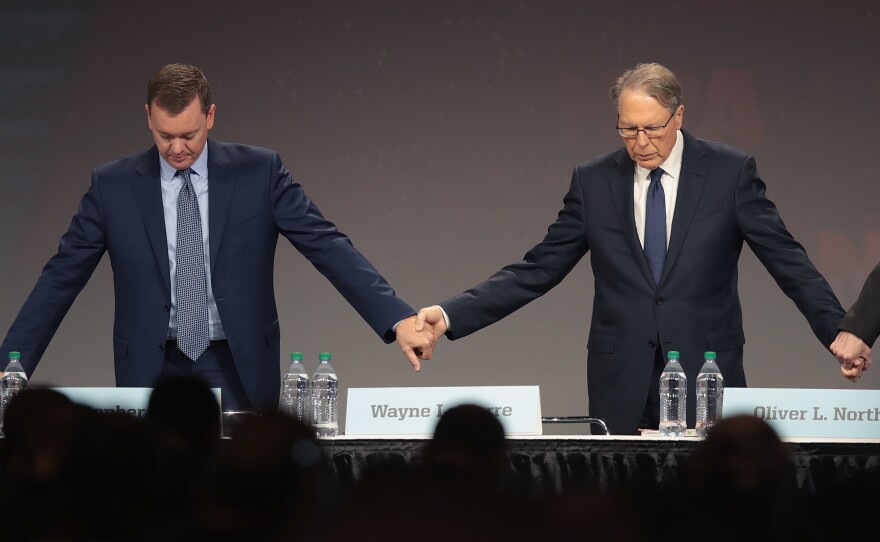 Chris Cox (L), the NRA's chief lobbyist, with CEO Wayne LaPierre at the annual meeting in Indiana in April.