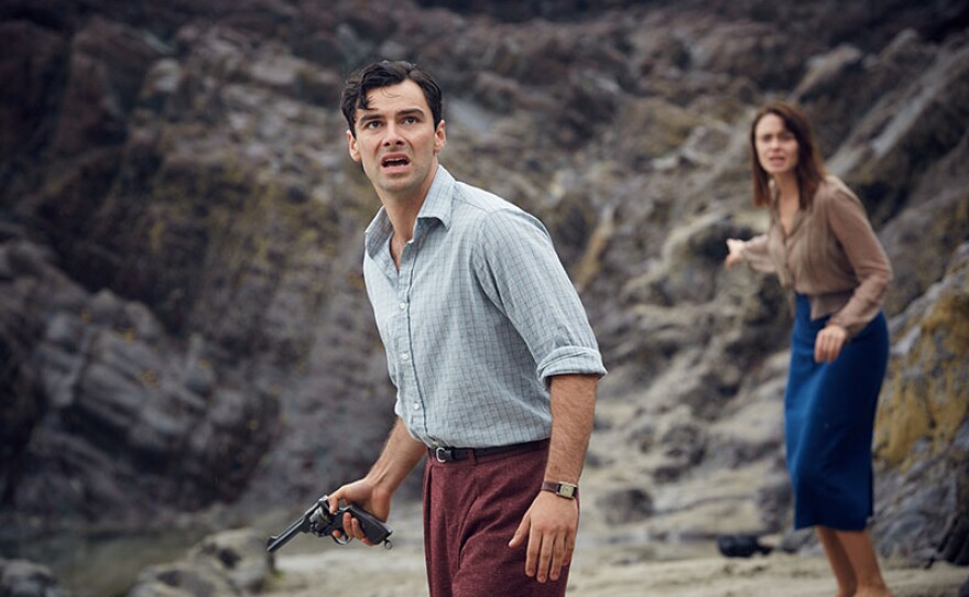 Aidan Turner and Maeve Dermody in a scene from AND THEN THERE WERE NONE, a star-studded adaptation of one of Agatha Christie’s most famous works.