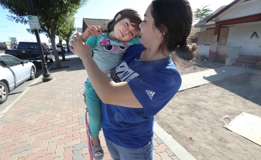 Diana Shalabi, 20, with her three-year-old, Amina, in Delano, California, in this photo taken Nov. 1, 2019.