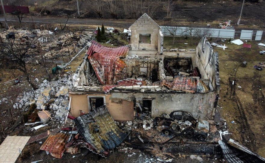 This aerial view taken near Kyiv on Wednesday shows a destroyed house in the village of Lukianivka.