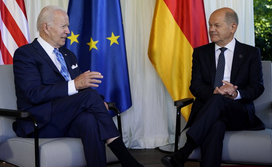 President Biden and German Chancellor Olaf Scholz speak during a bilateral meeting at the G7 Summit in Elmau, Germany, on Sunday.