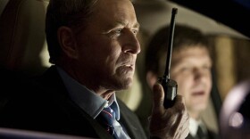 A scene from MIDSOMER MURDERS Season 12, featuring John Nettles as DCI Barnaby and Jason Hughes as DS Jones.