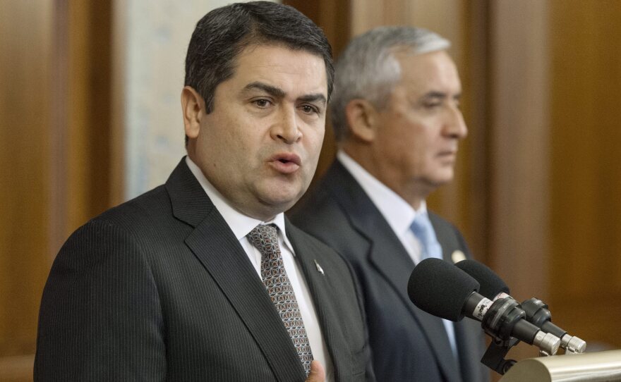 President of Honduras Juan Orlando Hernandez, left, delivers remarks on immigration beside President of Guatemala Otto Perez Molina.