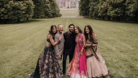 From left, Ashna Ahuja, Deepak Ahuja, Akash Mahtani, Shreya Ahuja and Madhu Ahuja attended Mahtani and Shreya Ahuja's wedding in Asheville, N.C., in 2025.