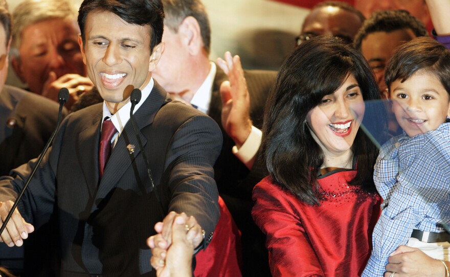 Alongside his wife Supriya and son Shaan Robert, Jindal addresses his gubernatorial victory party in 2007.