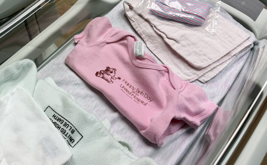 The nursery at United Hospital District in Blue Earth, Minnesota provides tiny Happy Birth Day shirts for newly born infants.