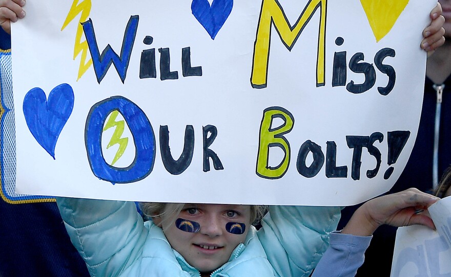 The departure was not altogether unexpected. Even the young fans saw it coming — like this girl, during the Chargers' loss to the Kansas City Chiefs on Jan. 1.