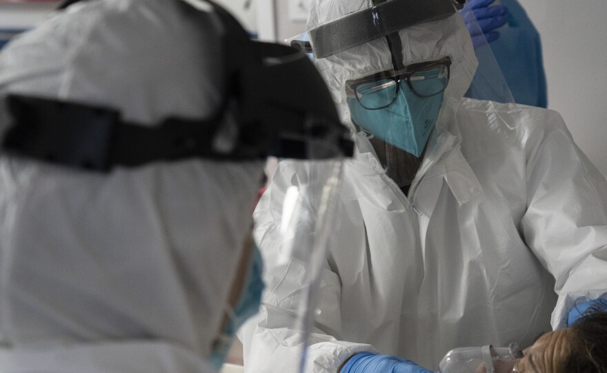 The U.S. hit a record high coronavirus hospitalization rate Wednesday, putting further strain on the nation's already stressed hospitals.