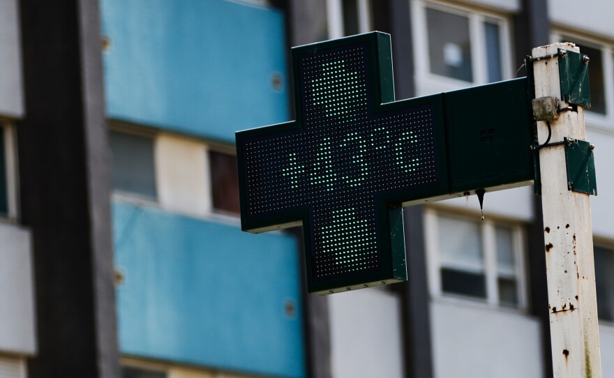 A drugstore sign shows the temperature 43 degrees Celsius (109,4 degrees Fahrenheit) in Rennes, western France, Monday, June 22, 2026.