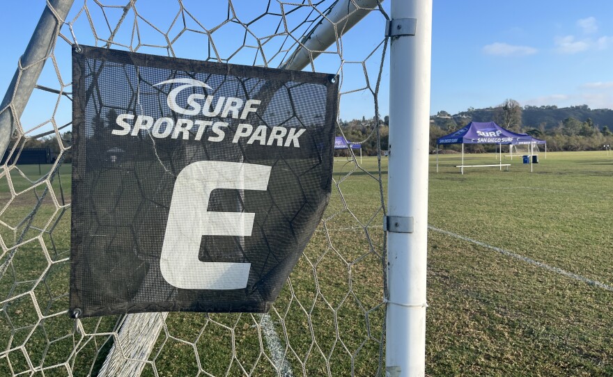A soccer net with Surf Sports Park branding on the side of the goal sits on a manicured field, Oct. 24, 2025.