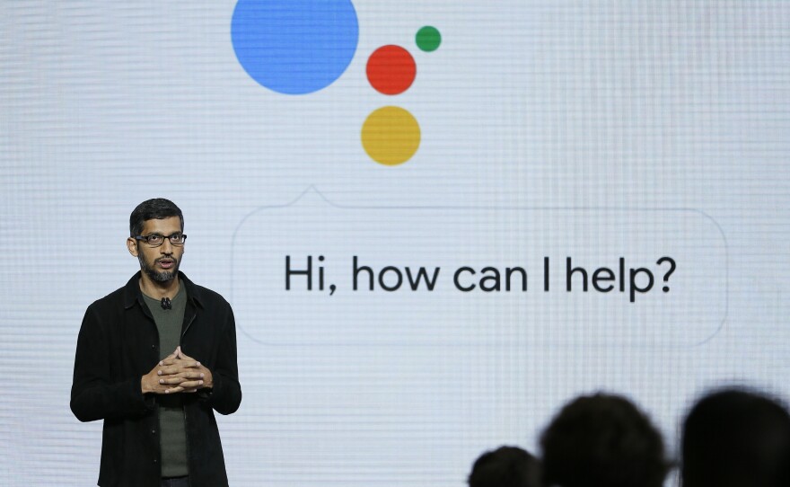 Google CEO Sundar Pichai talks about the new Google Assistant during a 2016 product event in San Francisco. The voice assistant is one of a number of Google products that will provide user data to the curation service that the company is launching Wednesday.