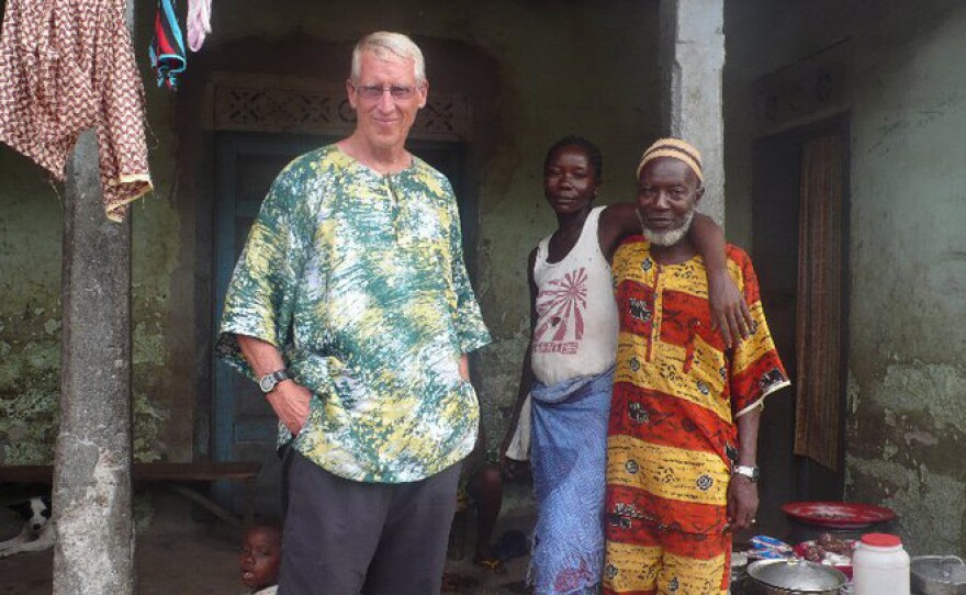 Chris Siegler with Pa Njai (in the red and yellow garb) in Kalangba, Sierra Leone, in 2011. As a Peace Corps volunteer, Siegler met Njai back in 1969.