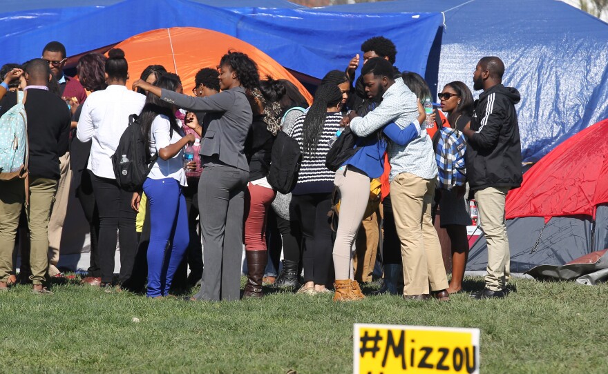 Students gather on the University of Missouri campus to show support for Jonathan L. Butler, the 25-year-old graduate student who is holding a hunger strike on campus in Columbia, Missouri.
