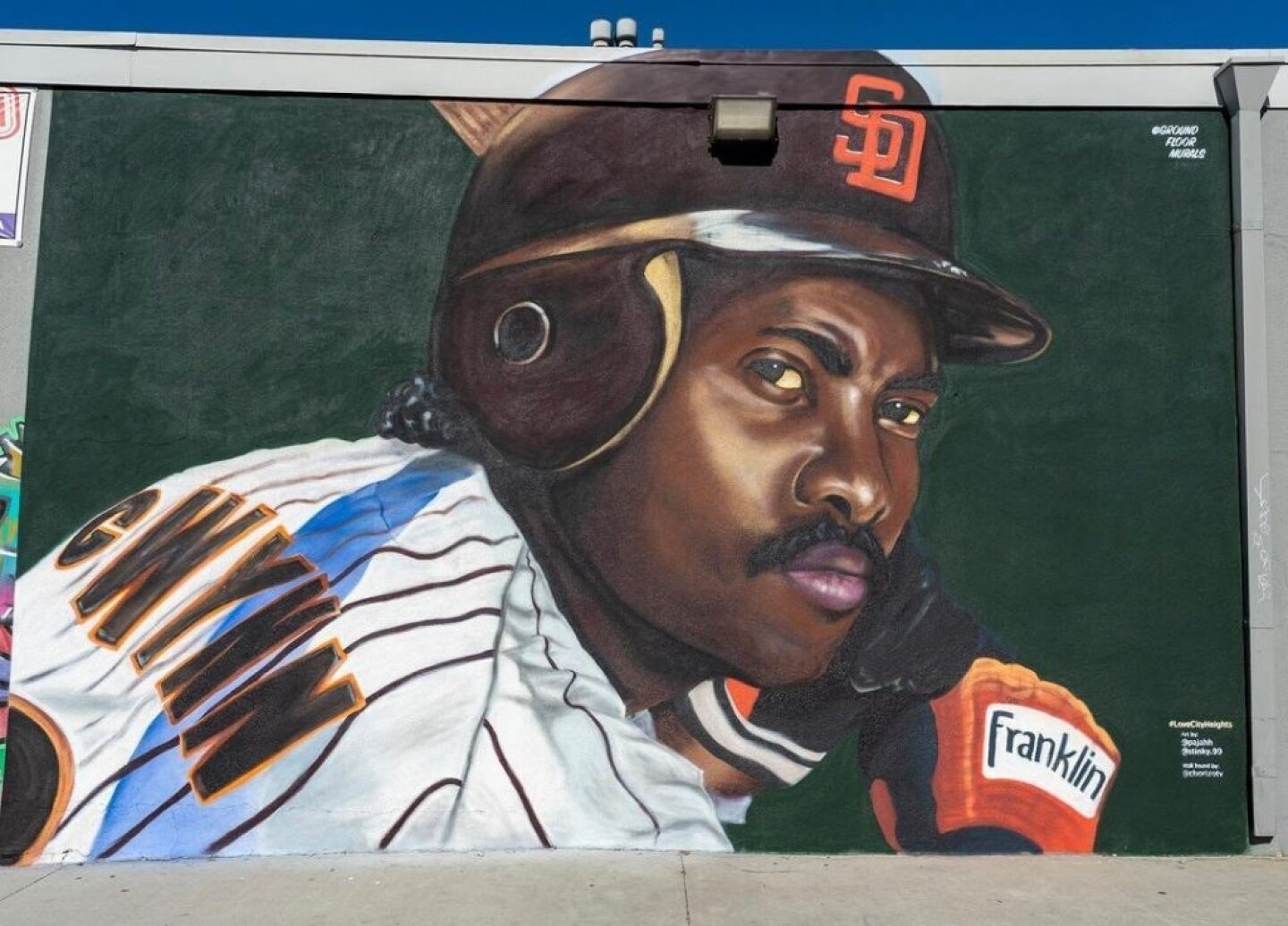 The mural of Tony Gwynn on the back wall of the Undisputed gym in City Heights was created by Paul Jimenez and Signe Ditona of Ground Floor Murals in 2020. This striking portrayal of the legendary Mr. Padre marked the duo's 10th mural and their first human portrait. (May 9, 2023)