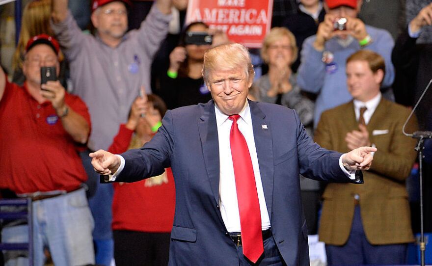 President-elect Donald Trump points to his supporters during his "Thank You" rally in Fayetteville, N.C., on Tuesday night.