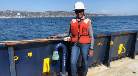 Goldie Phillips is pictured aboard a research vessel on Aug. 2, 2018. She’s going to help colleagues lower microphones into the waters off the coast of San Diego and La Jolla.