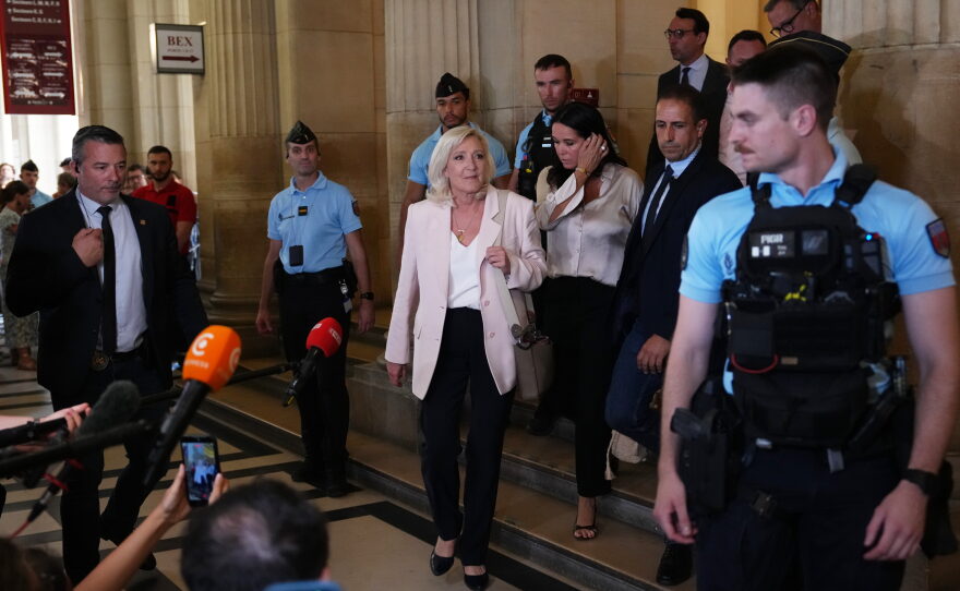 Far-right leader Marine Le Pen leaves the courtroom after the verdict of her appeal trial, in Paris, France, Tuesday, July. 7, 2026.