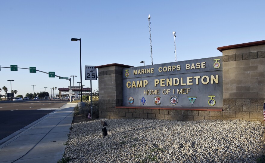 A human smuggling investigation by the military led to the arrest of 16 Marines on Thursday while carrying out a battalion formation at California's Camp Pendleton, a base about an hour's drive from the U.S.-Mexico border.