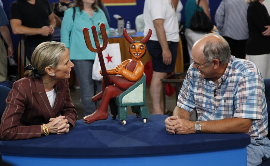Dessa Goddard (left) appraises a Japanese bronze mythical figure, ca. 1880 in Corpus Christi, Texas. ANTIQUES ROADSHOW “Kooky & Spooky”