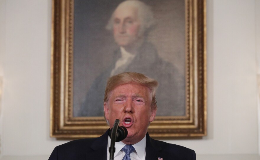 President Trump speaks in the Diplomatic Reception Room of the White House on Monday regarding the mass shootings in El Paso, Texas, and Dayton, Ohio, over the weekend.