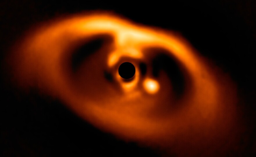 When she saw photos of the young planet PDS 70 b, "It looked so clear," says Miriam Keppler, who led a team in the discovery.