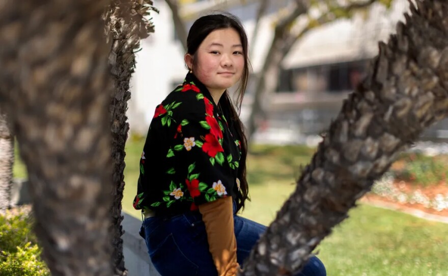 Janet, a high school senior, outside of Hawthorne High School in Los Angeles on March 27, 2025. Janet is hoping to study theatre in college.