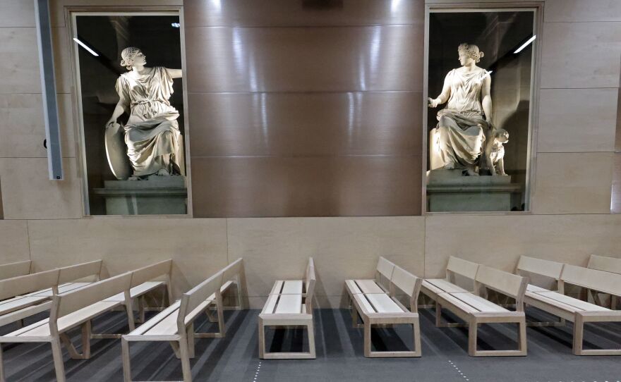 A view of the temporary courtroom set up at the Palais de Justice of Paris, built especially to host the trial.