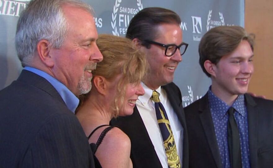 Brent (left) and Kelly King (center left), the parents of Chelsea King; filmmaker Bruce Caulk (center right) and Tyler King pose for a photo at the "Chelsea's Light: A Brother's Journey" documentary film premiere on Sept. 23, 2014.