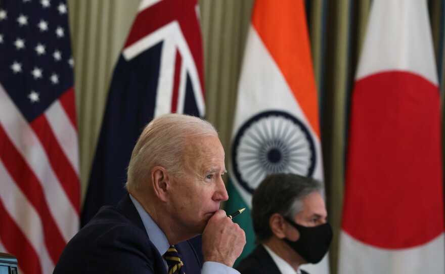 President Biden and Secretary of State Antony Blinken participate in a virtual meeting with world leaders on March 12 at White House.