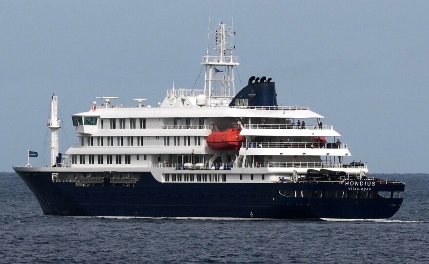 The MV Hondius cruise ship departs the port in Praia, Cape Verde, Wednesday, May 6, 2026.
