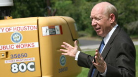 Houston Mayor Bill White gestures during a visit to a construction site in the city.