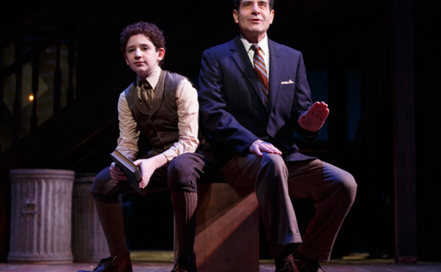 Matthew Schechter and Tony Shalhoub (both playing Moss Hart) in a scene from Lincoln Center Theater's production of "Act One," a play written and directed by James Lapine from the autobiography by Moss Hart, at the Vivian Beaumont Theater (150 West 65 Street).