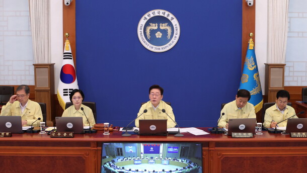 South Korean President Lee Jae Myung, center, speaks during a cabinet meeting at the presidential office in Seoul, South Korea, Tuesday, Aug. 18, 2026.
